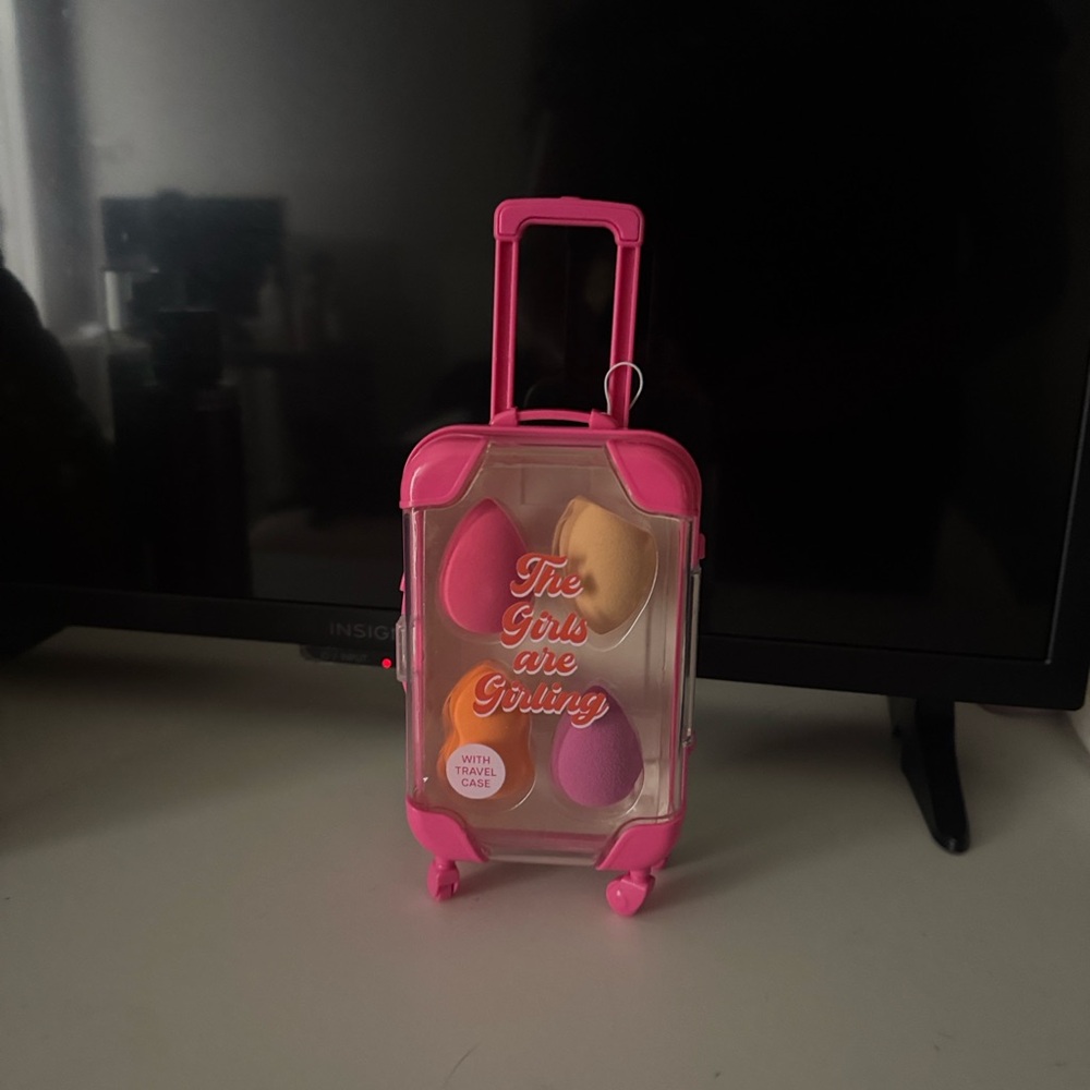 Pink Mini Suitcase with Makeup Sponges